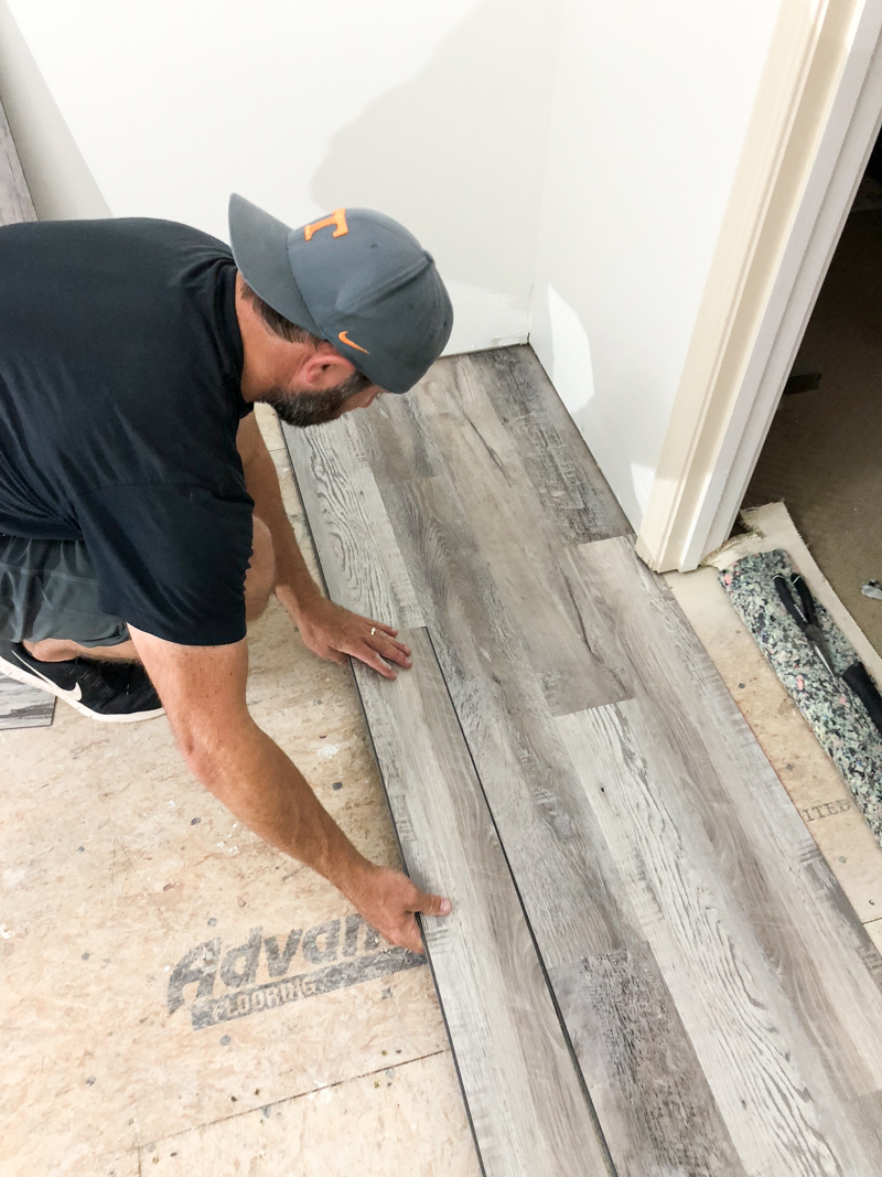 Cudgel Contracting crew laying LVT flooring